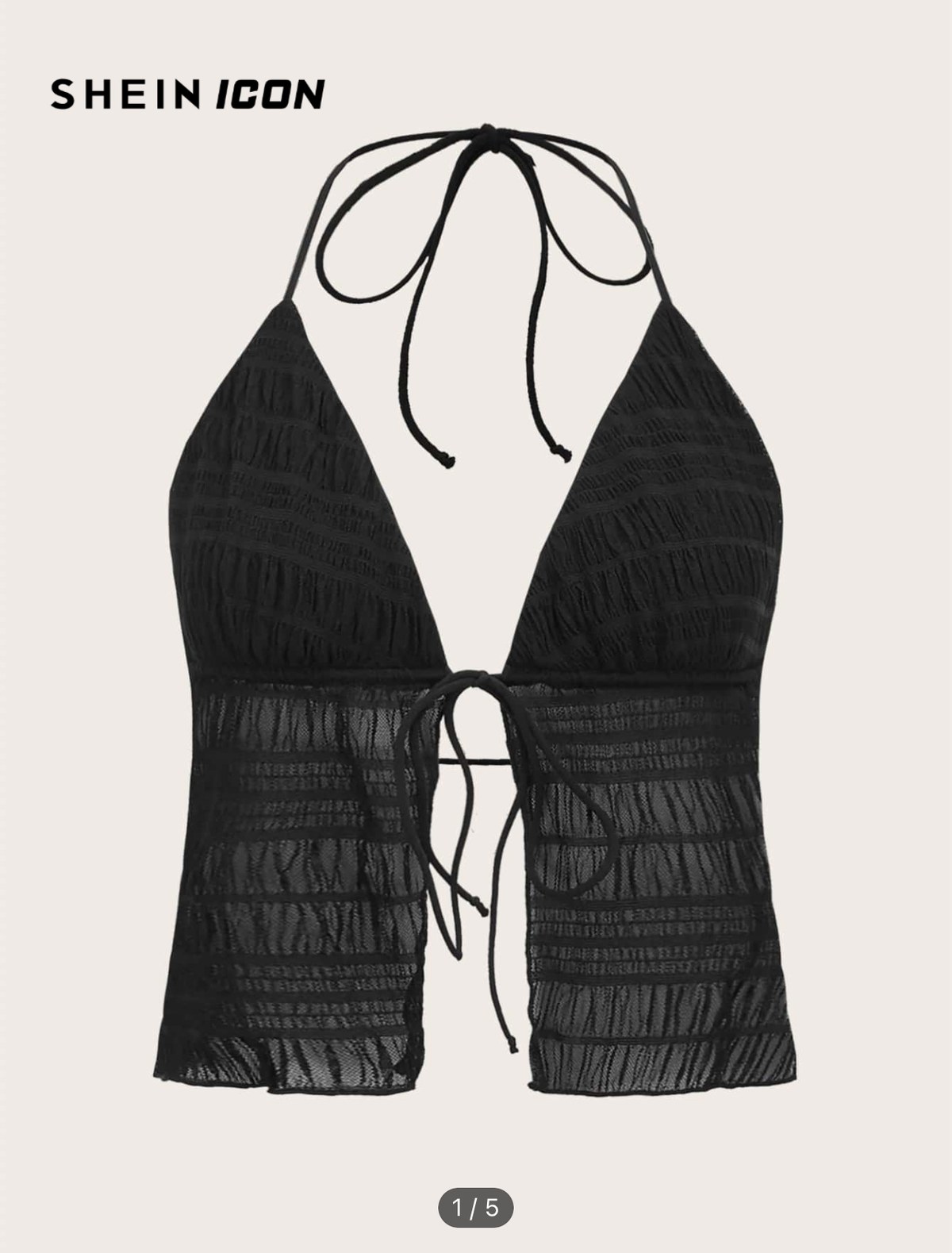 Top negro de crochet anudado al cuello