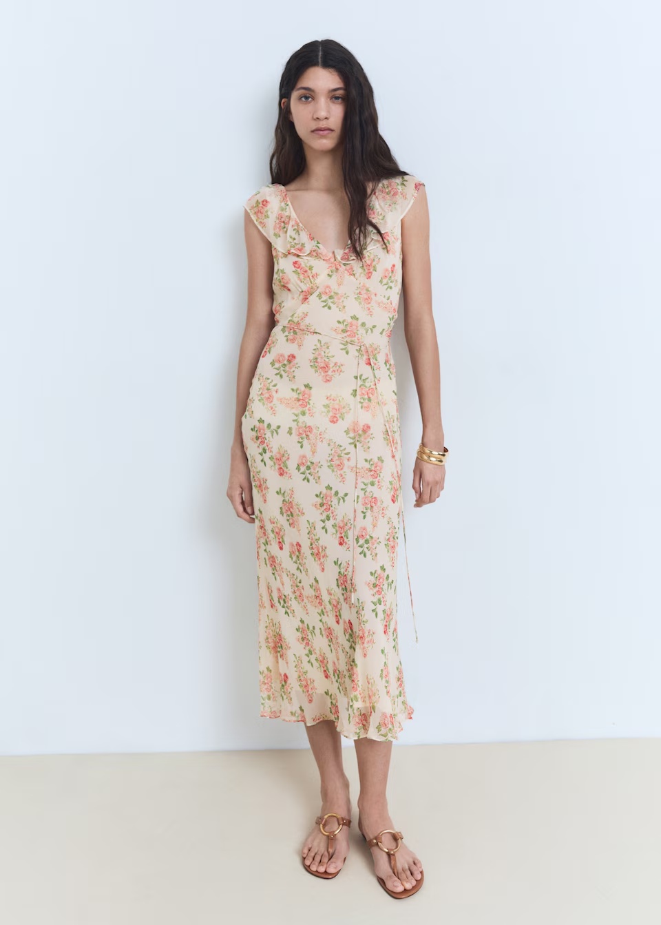 Vestido crudo midi con flores y volante