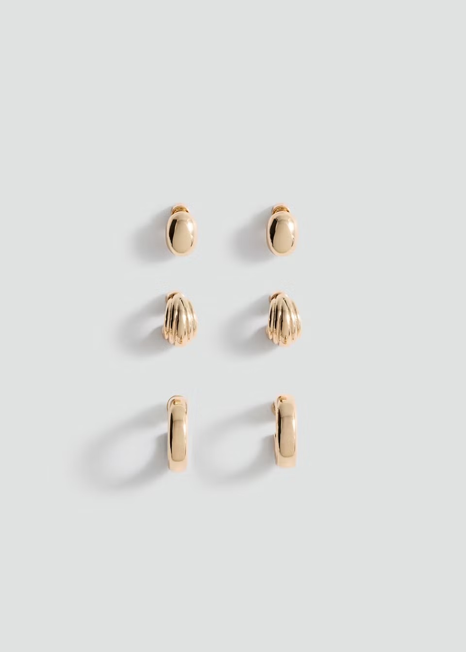 Set de tres pendientes dorados